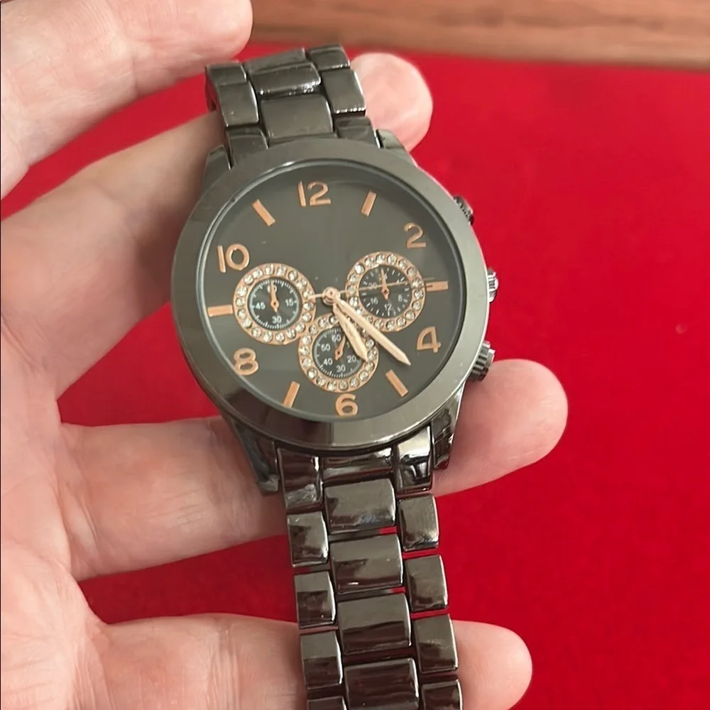 Black Metal Watch with Gold Accents